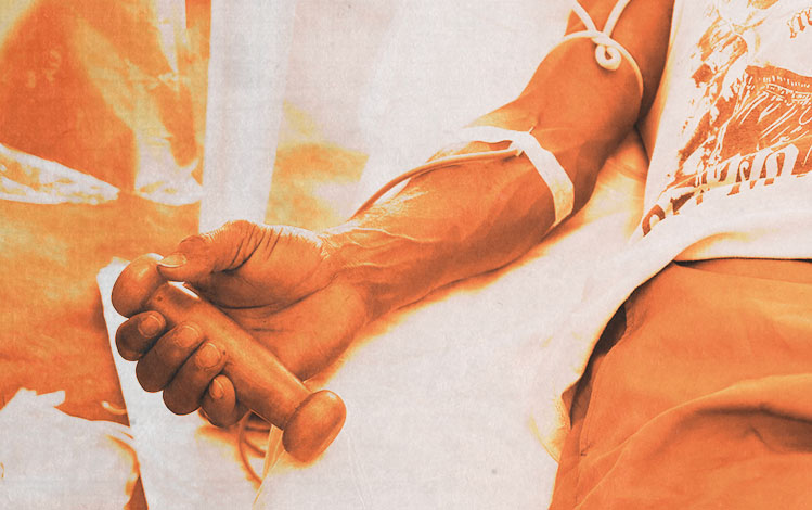 Arm of someone giving blood in India